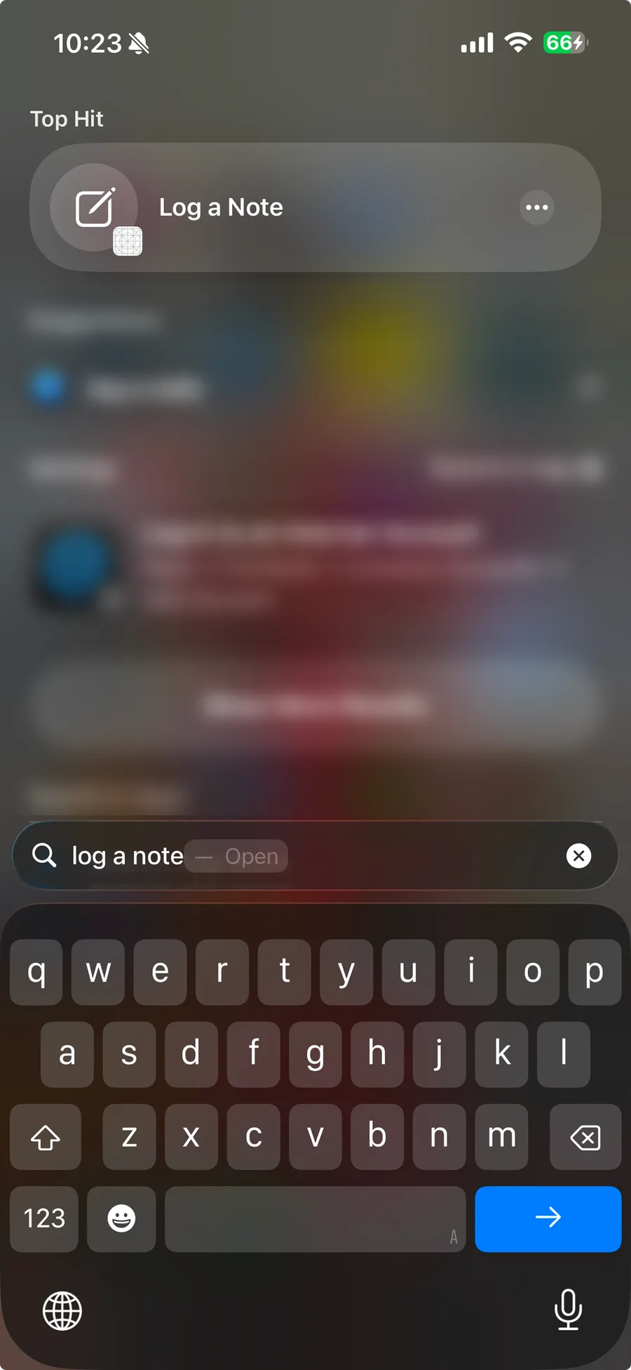 Spotlight showing the Log a Note action as the top hit